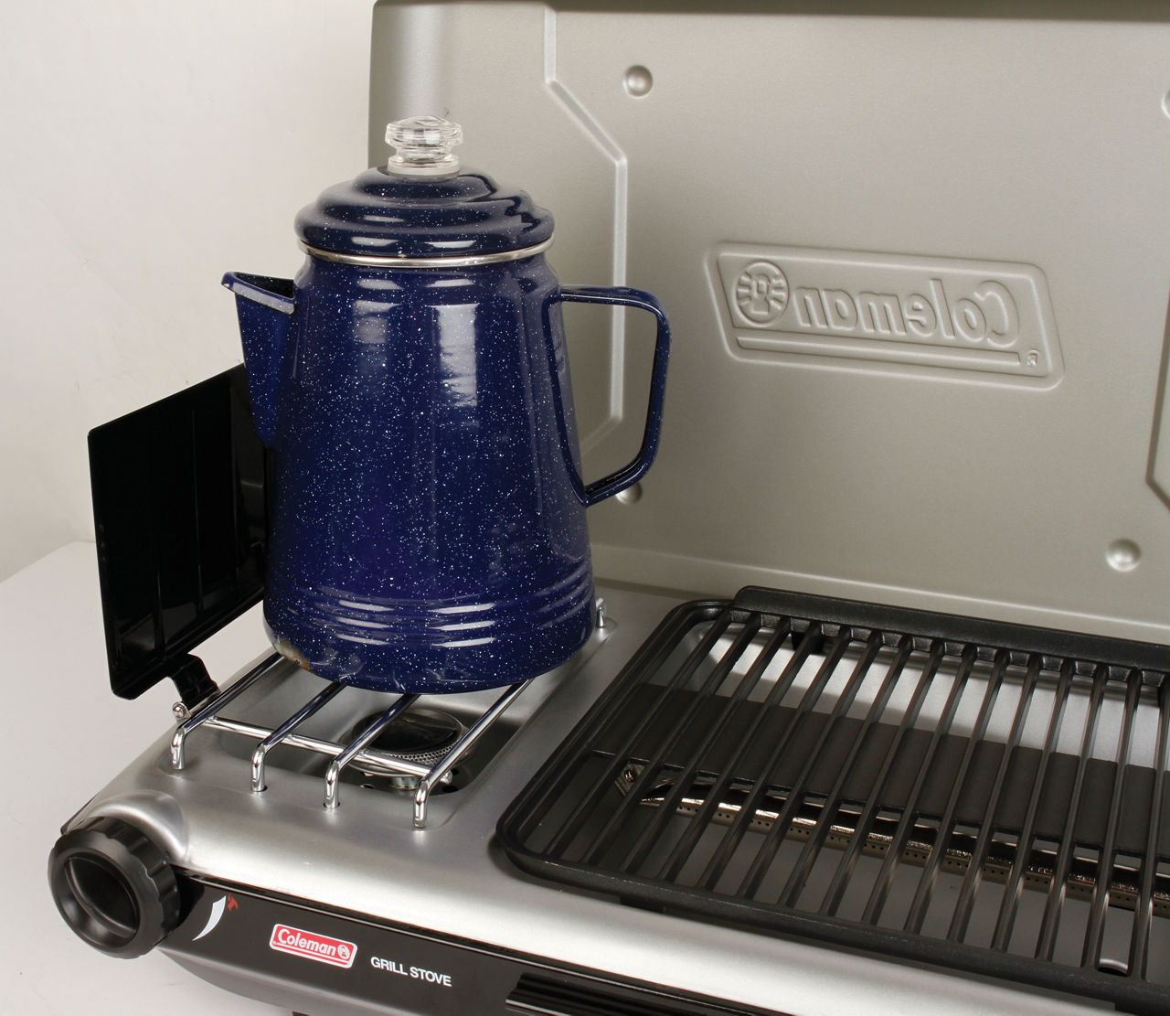 Coleman Deluxe Tabletop Propane 2-in-1 Grill/Stove | 2-Burner | Black | Push-Button Ignition