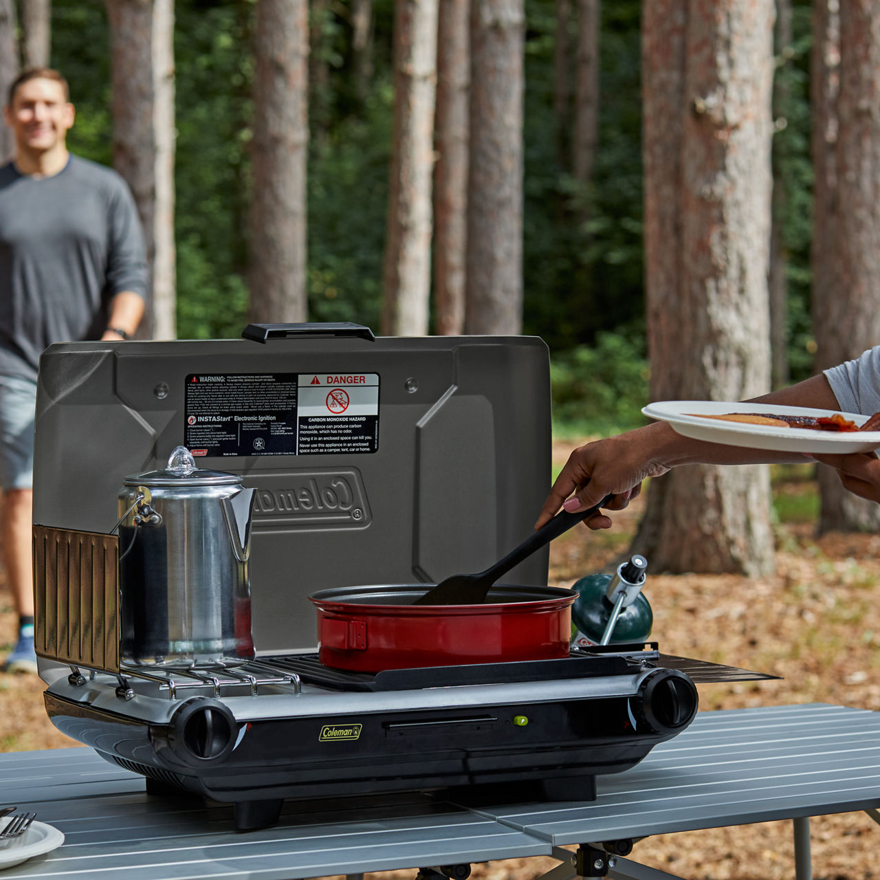 Coleman Deluxe Tabletop Propane 2-in-1 Grill/Stove | 2-Burner | Black | Push-Button Ignition
