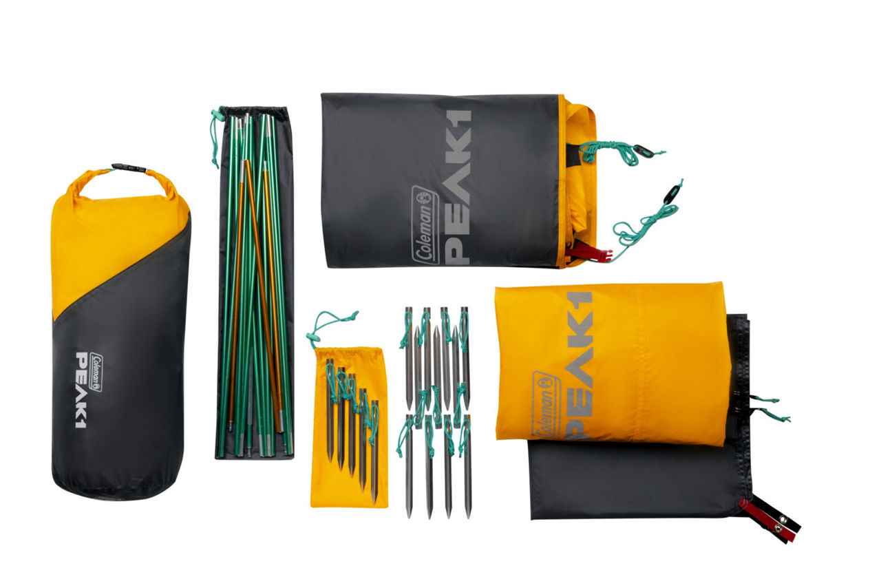 Coleman PEAK1™ 3-Person Backpacking Tent? | Trail Weight 6 lbs. 4.6 oz.??; Packed Weight 7 lbs. 8.7 oz.; LWH 90” x 72” x 45”?? | Marigold & Dark Stone
